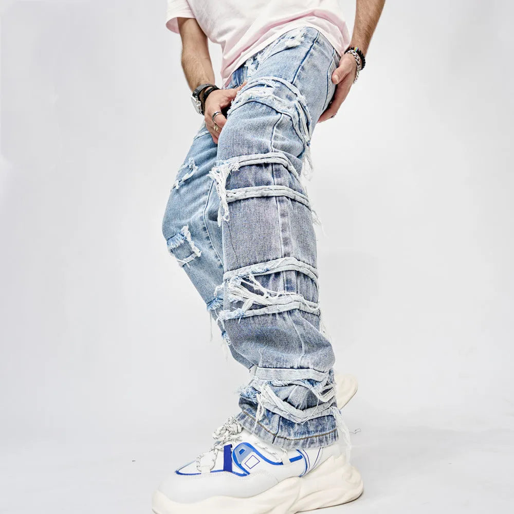 Men's blue cotton full length patched straight fit hip hop jeans on model