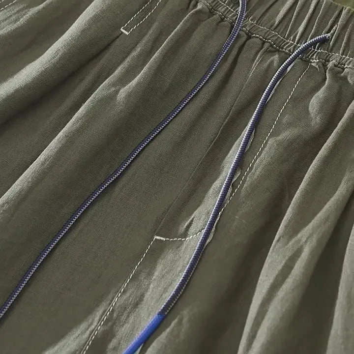 Men's loose straight linen shorts in green or black with drooping casual style