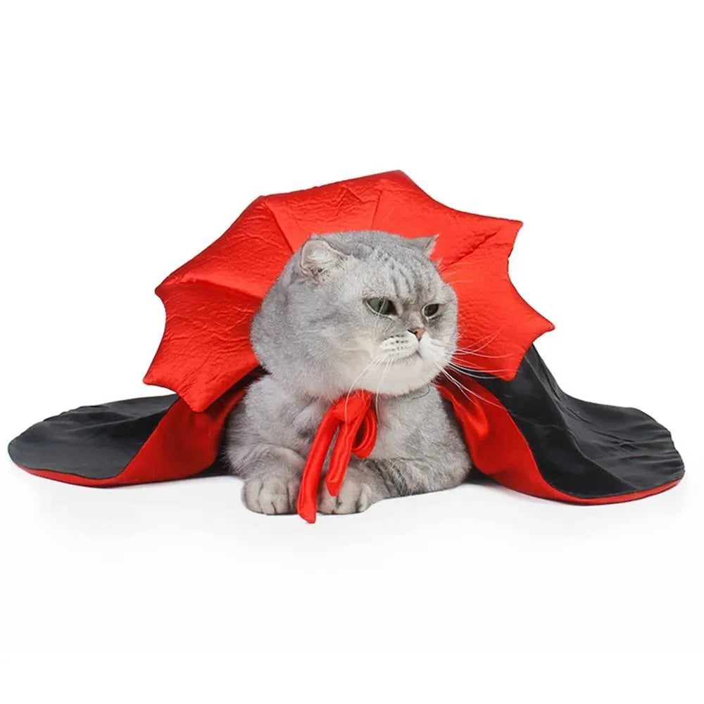 Small black pet vampire cloak costume for dog or cat on hanger with S M L size tags.