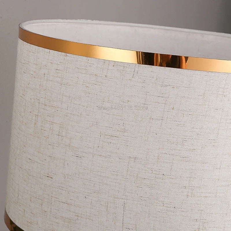 Iron body table lamp with cloth shade in black, gold or white colour for bedroom lighting