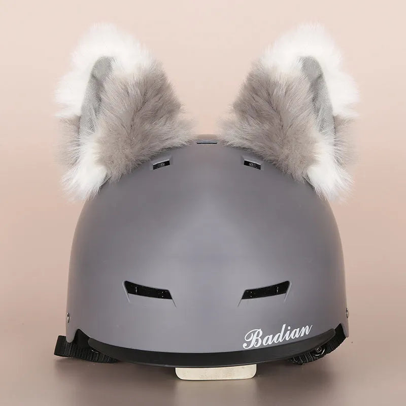 Soft plush cartoon character cover stretched over a pair of black on-ear headphones.