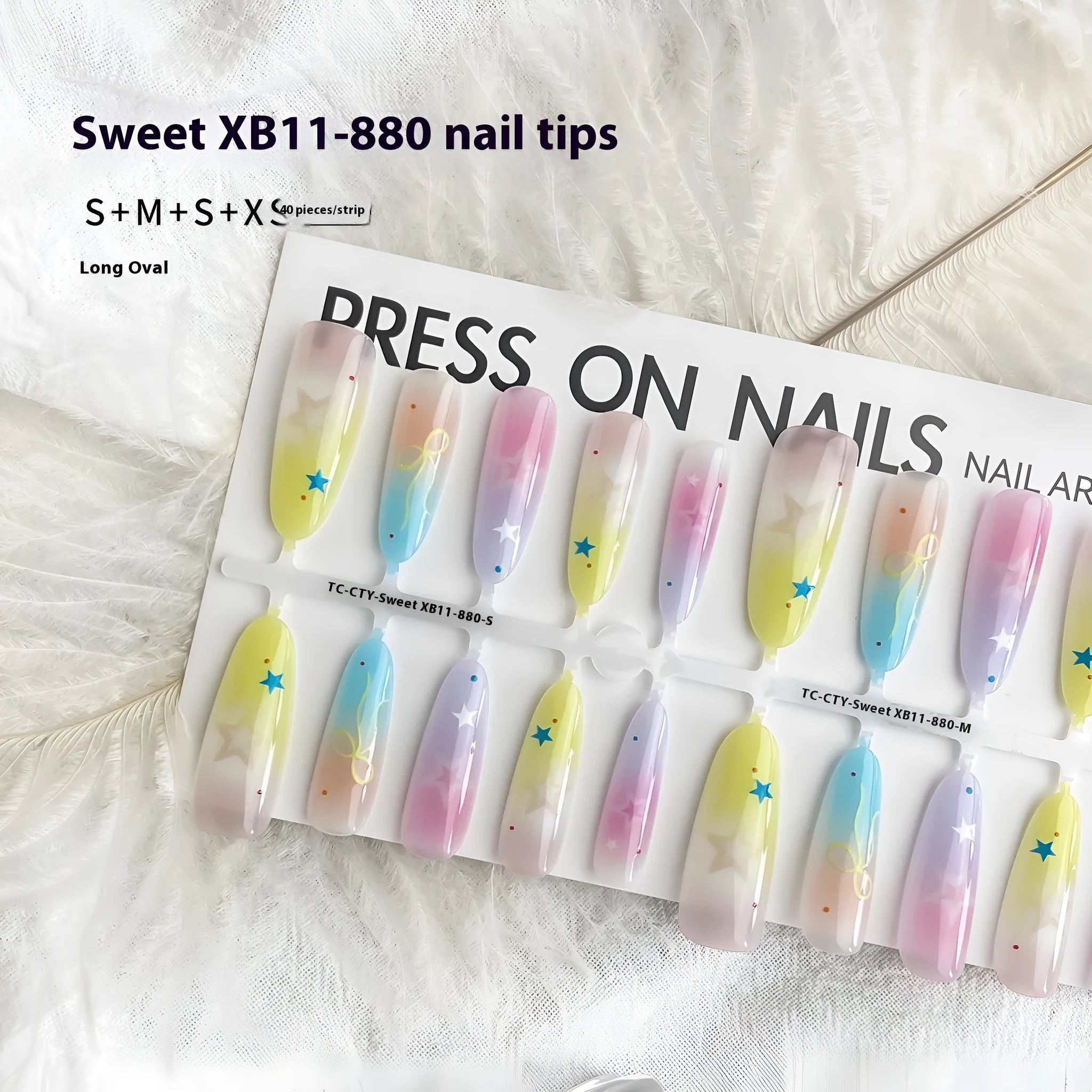 Dopamine Cartoon XINGX oval almond nail sticker set in sweet XB11-880 colour, natural frosted non-sealing layer, on a woman's nails.