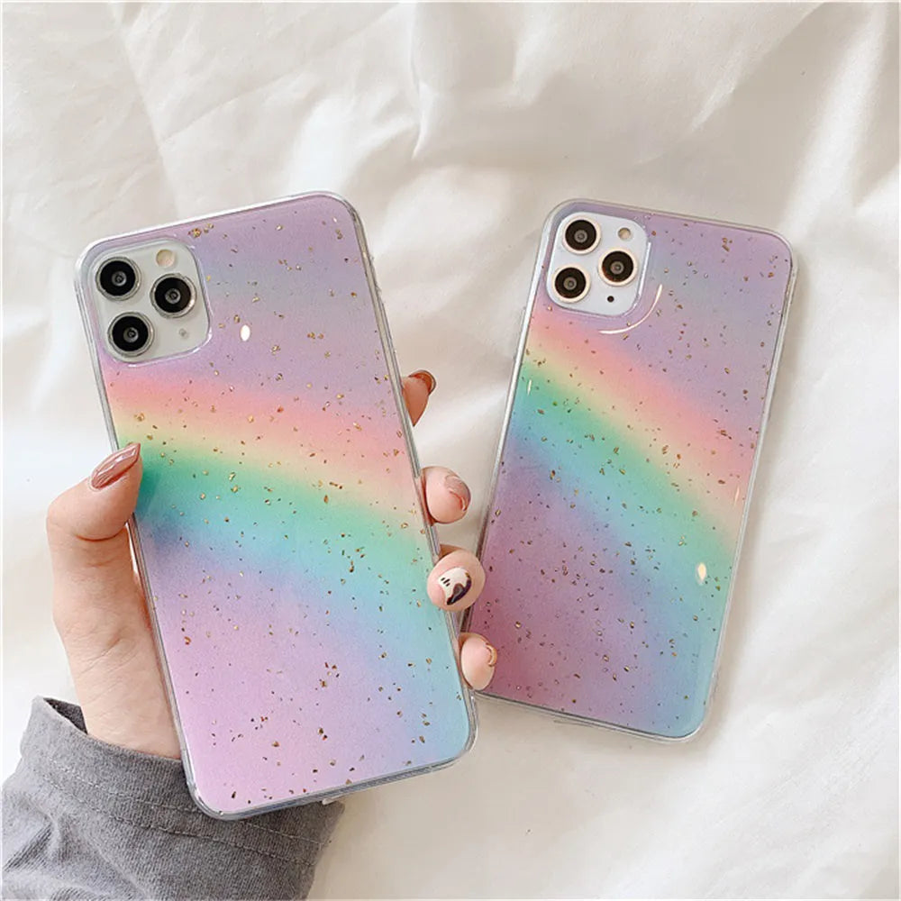 Colourful rainbow gradient striped TPU protective case for various iPhone models on a white background.