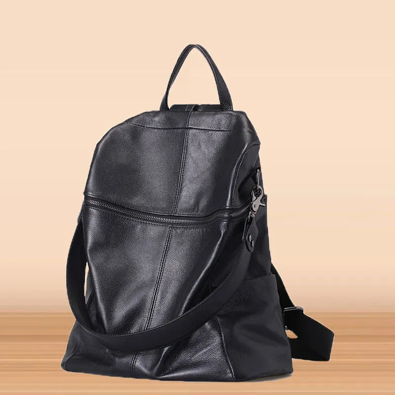 Genuine leather women's retro backpack with waterproof function and organised internal compartments