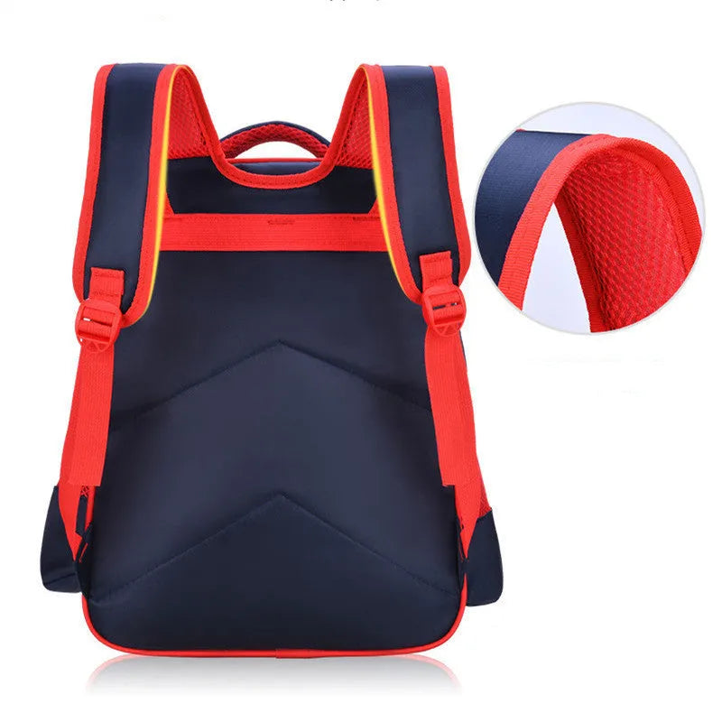 Blue cartoon-print children's school backpack with pencil case on a strap.