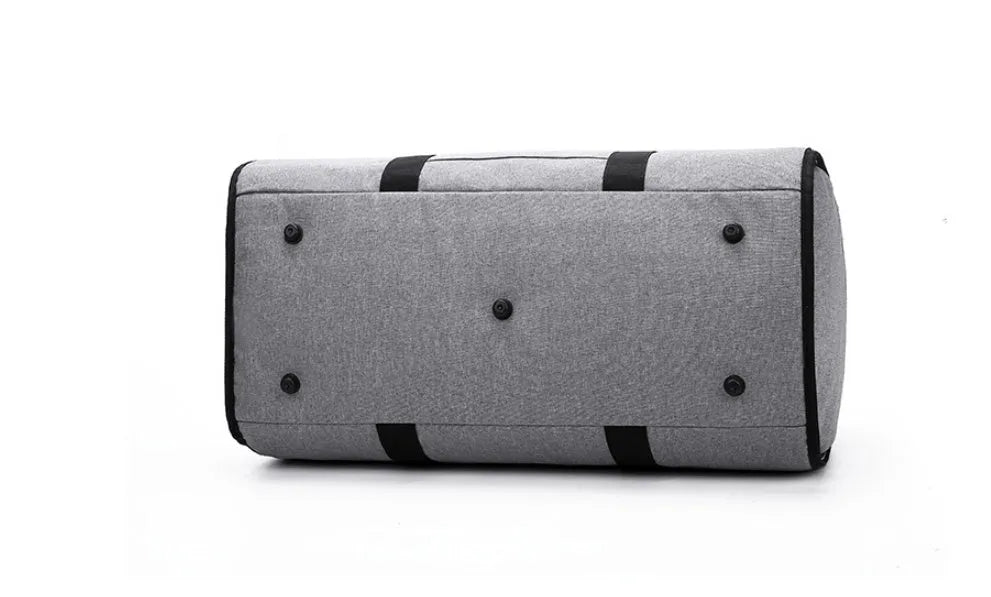 Cylinder-shaped travel duffle bag in Oxford cloth, shown in a choice of colours including black, blue, red, and light grey.