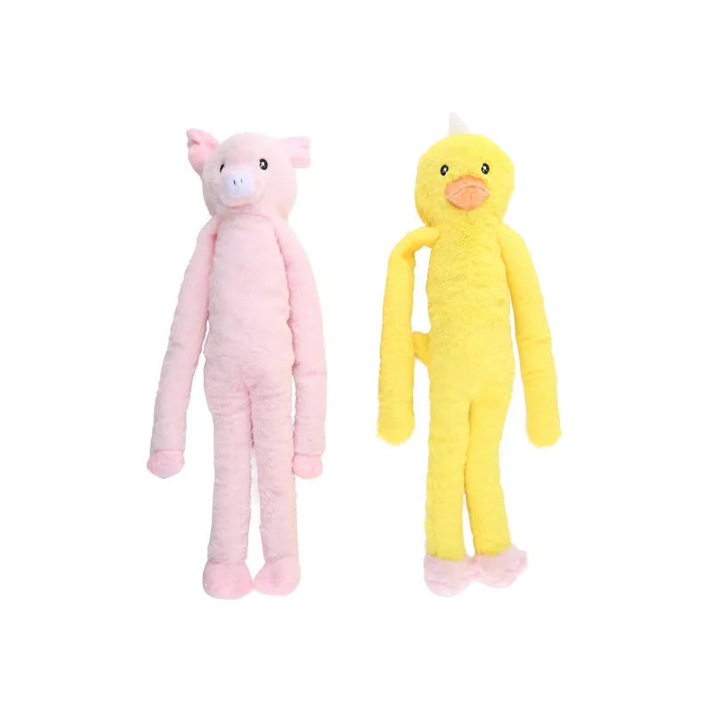 Large pink and yellow plush dog toy with interactive rattle and crinkle paper sound features
