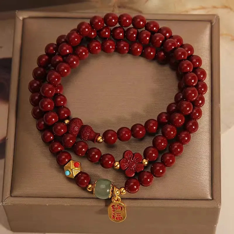 Women's multi-circle cinnabar bracelet with gourd and five petal flower design
