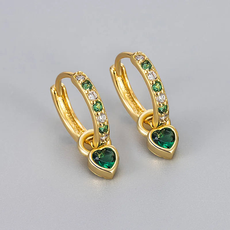 Gold-coloured clip-on earring for women with a heart-shaped drop featuring a pink zircon stone.