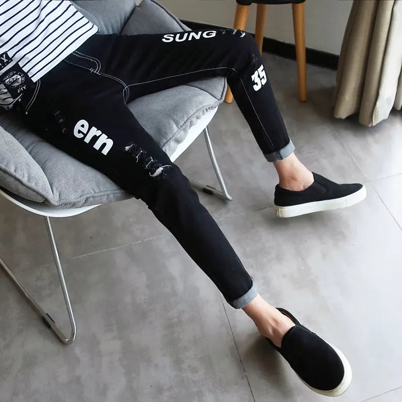 Men's black ripped ankle jeans in regular denim with micro elastic, sizes 28-34, autumn casual style