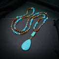 Blue turquoise pendant necklace with mixed gem inlay on ball bead chain
