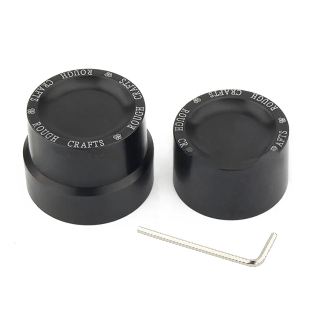 Black CNC aluminium front and rear axle decorative cover caps for Harley Sportster motorcycles.