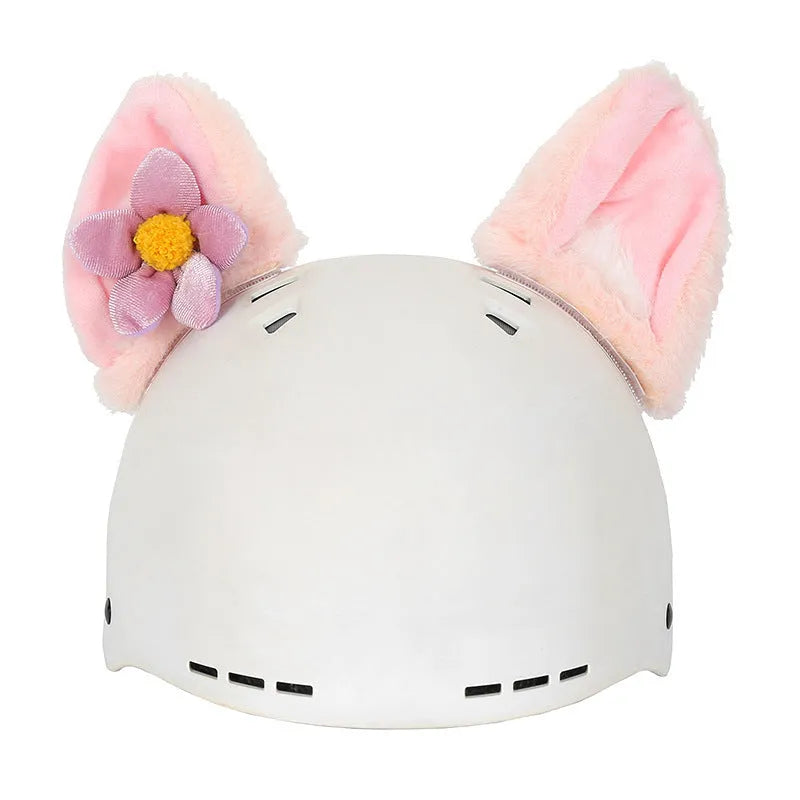 Soft plush cartoon character cover stretched over a pair of black on-ear headphones.