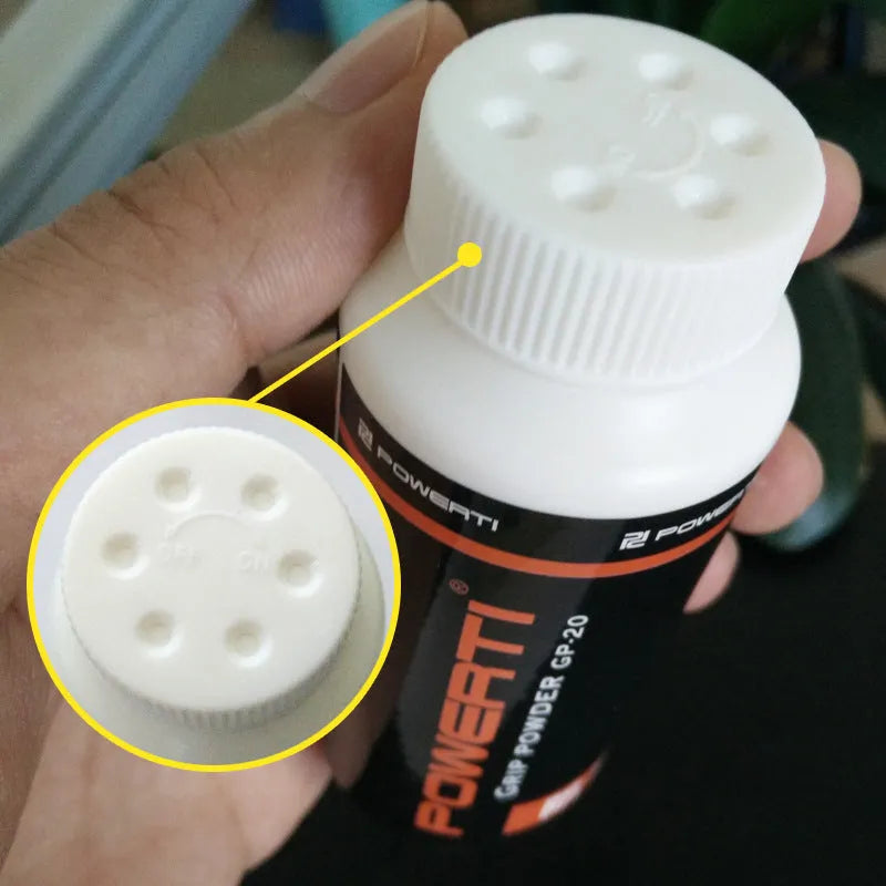 White magnesium carbonate sports anti-slip powder in container for badminton and gym use.