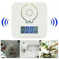 White wireless carbon monoxide alarm detector designed for wall mounting.