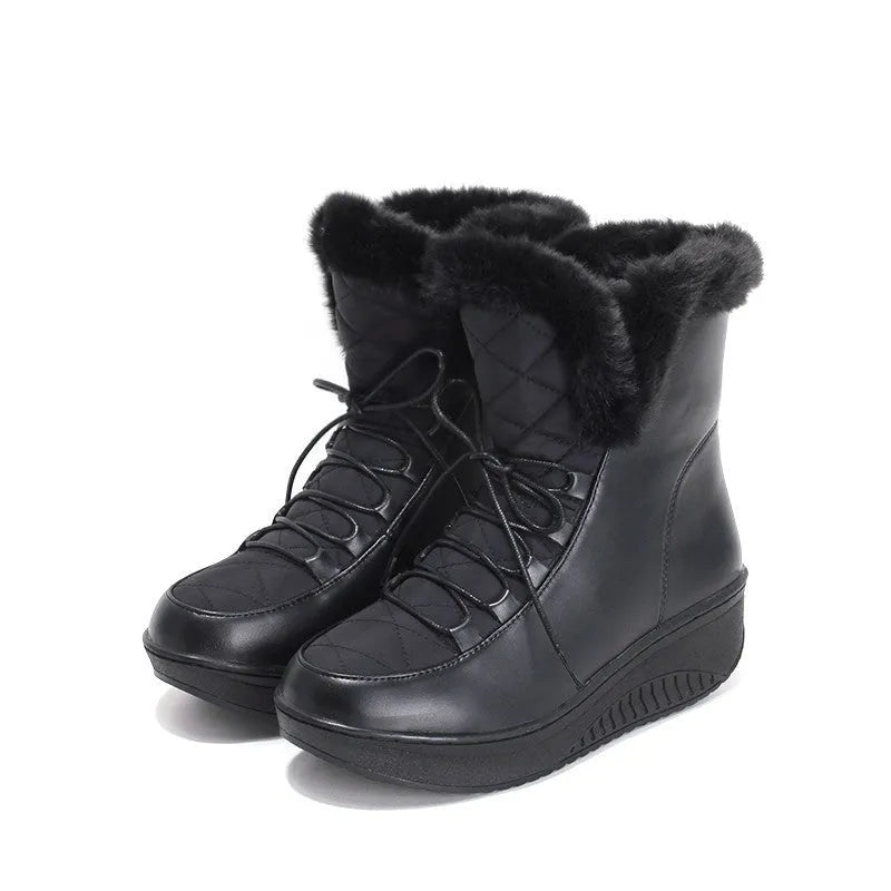 Black women's ankle winter boots with lace-up front, platform sole, and plush lining.
