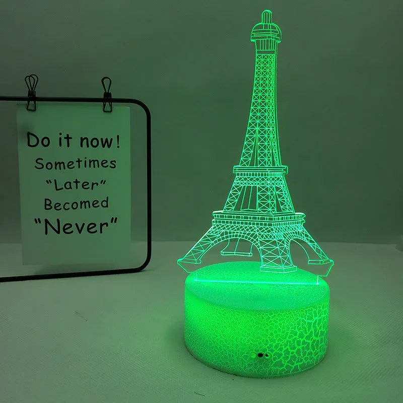 Eiffel Tower themed table lamp with multicolour LED glow on a acrylic shade.