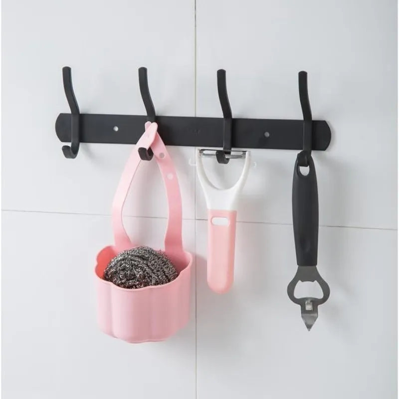 Plastic kitchen sink drain basket in dark blue colour showing Nordic style design.