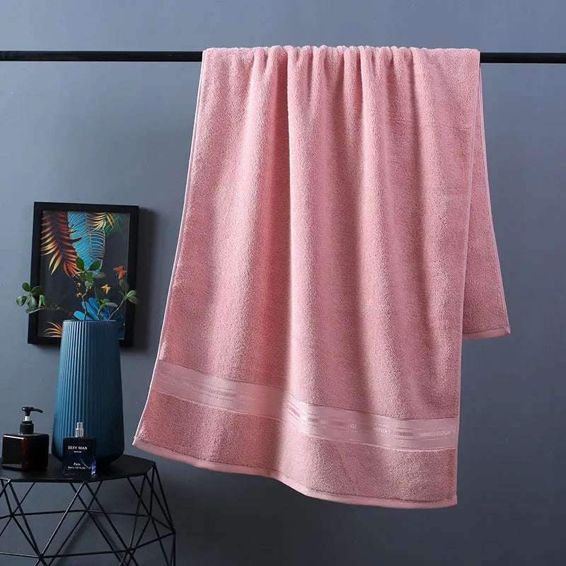 Pure cotton bath towel set showing three pieces in blue colour with floral pattern detail