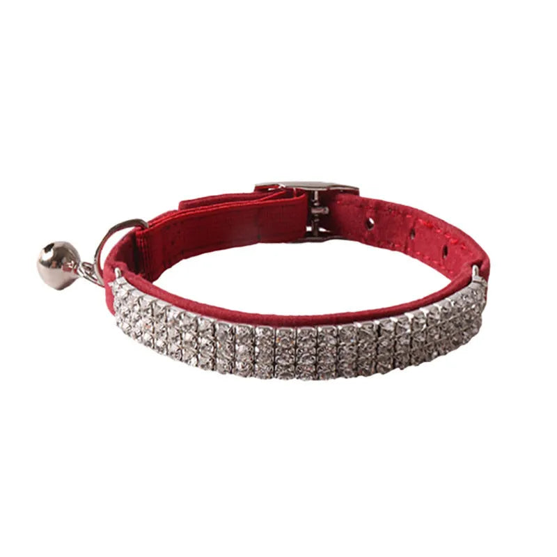 Flocked fabric cat collar with elastic buckle and gang drill pattern in multiple colours.