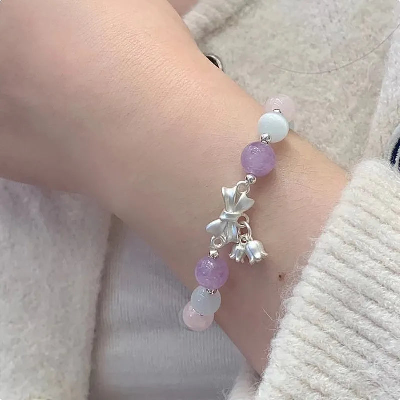 Lavender purple crystal bracelet with bowknot design measuring 10mm for women's fashion.