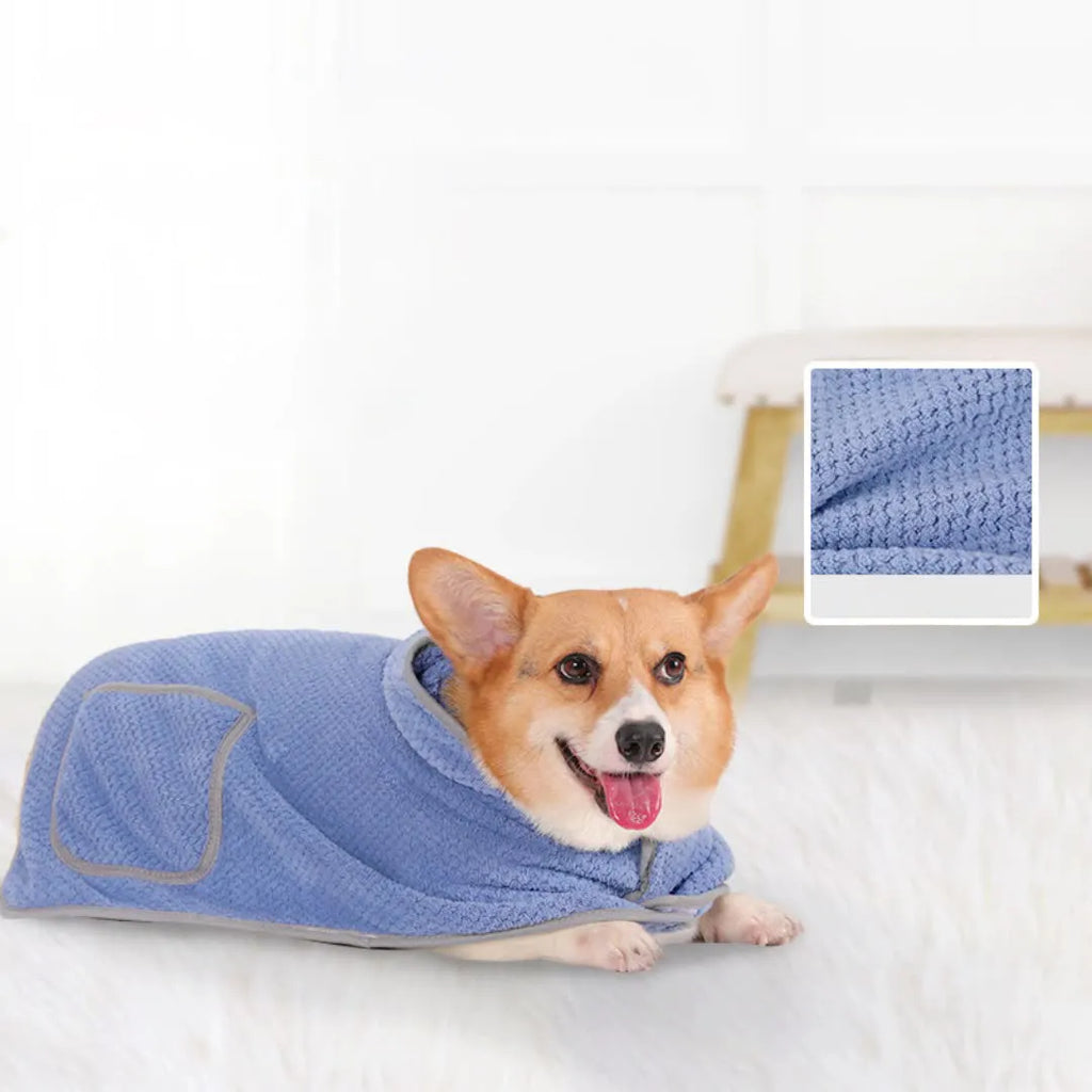 Blue adjustable dog bath robe towel drying a golden retriever after a bath.