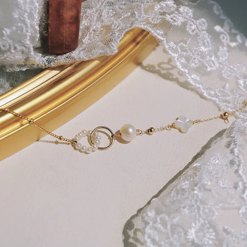 Natural pearl women's bracelet with 14k gold-plated accents in picture colour
