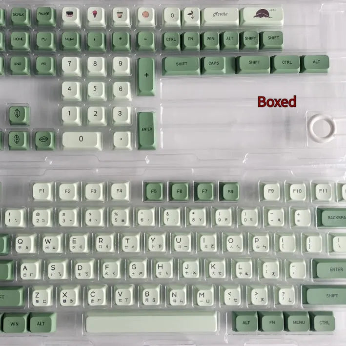 124 PBT dye-sublimation keycap set in matcha green colour on a keyboard.
