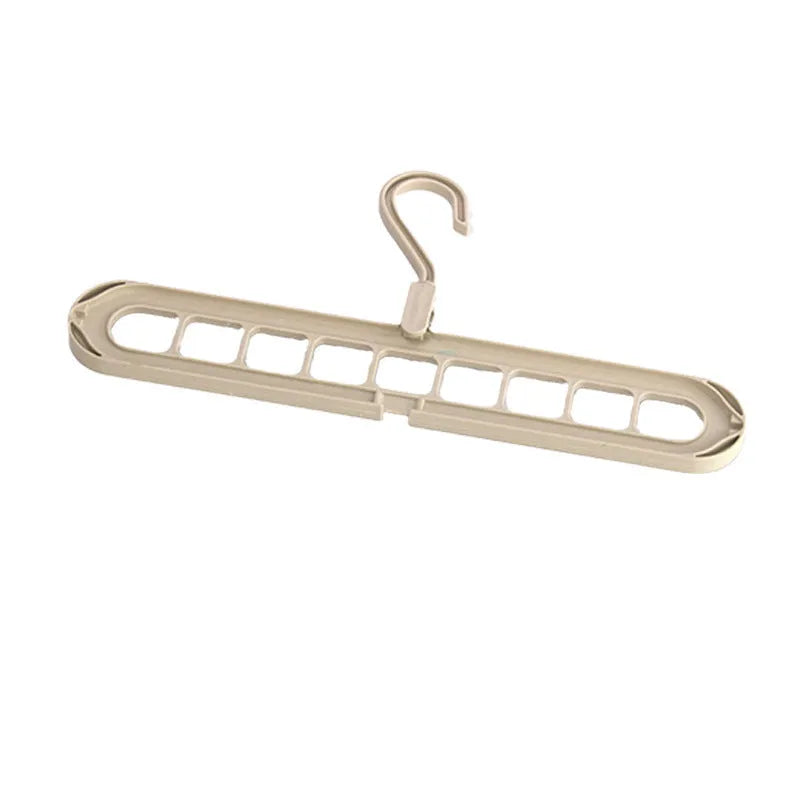 Green plastic multifunctional hanger with nine holes for folded trousers storage