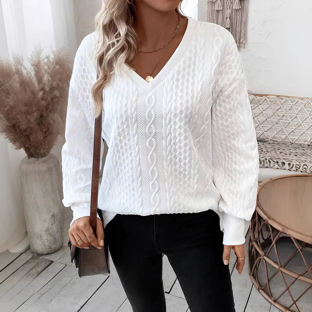 Loose fit milky white long sleeve T-shirt with casual styling and 3D pattern detailing