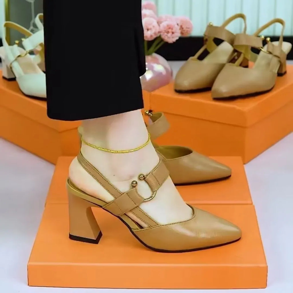 Women's apricot leather sandals with a closed toe, chunky heel, and an oversleeve fastening on the back.