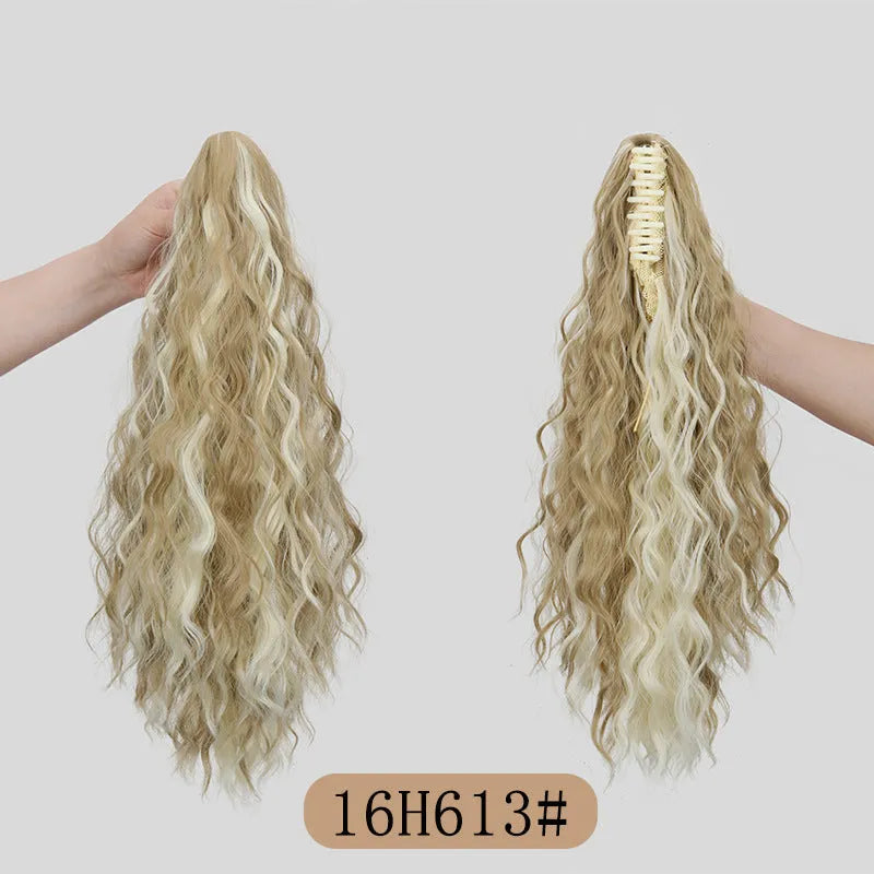 Synthetic corn curler wig with a textured water ripple grip ponytail, shown in a shade from the available colour range.