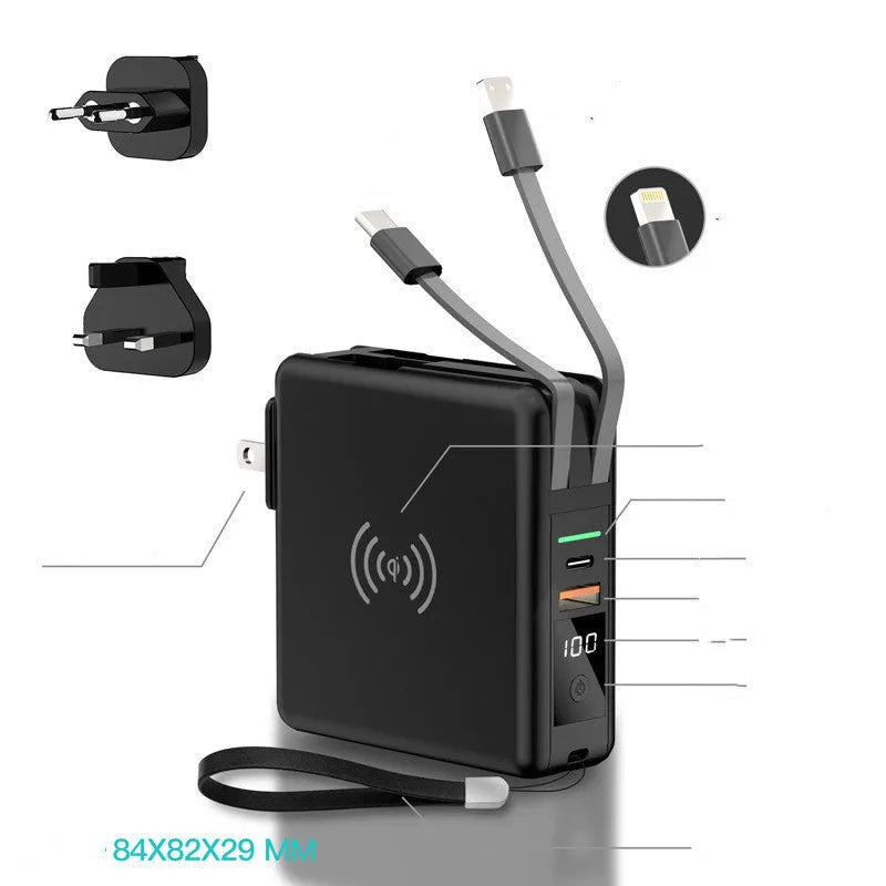 Super QI Power Bank showing fold-out UK, EU, US, and AU plug pins next to a smartphone on its wireless charging surface.