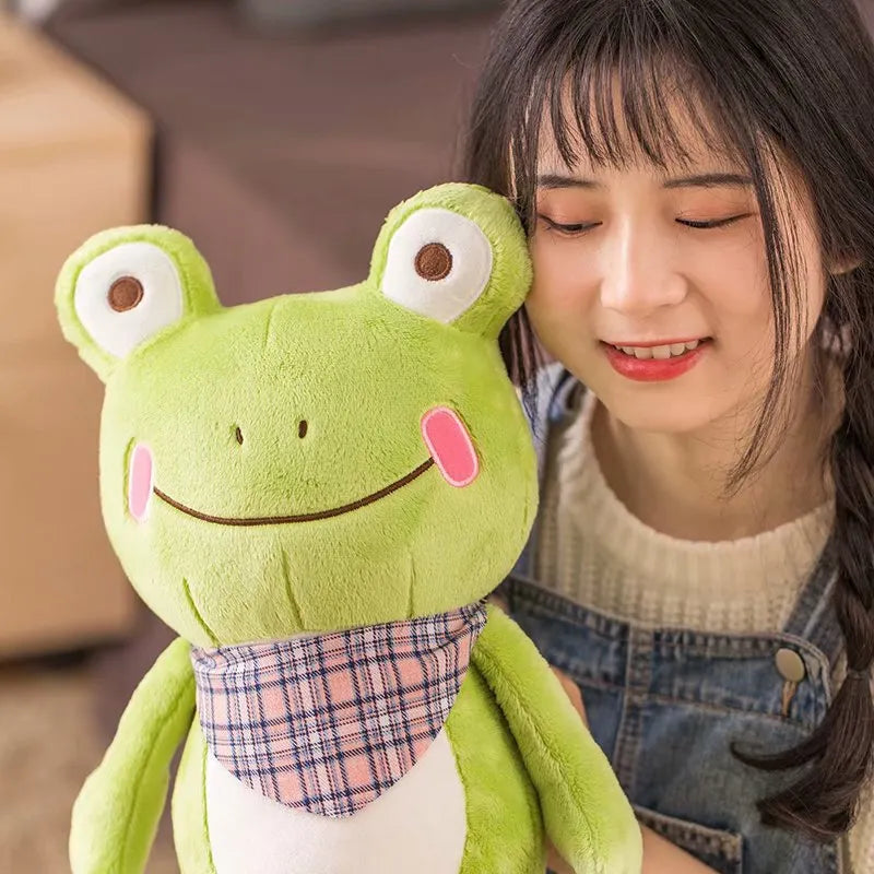 Cute scarf frog doll plush toy in blue with scarf, on a neutral background