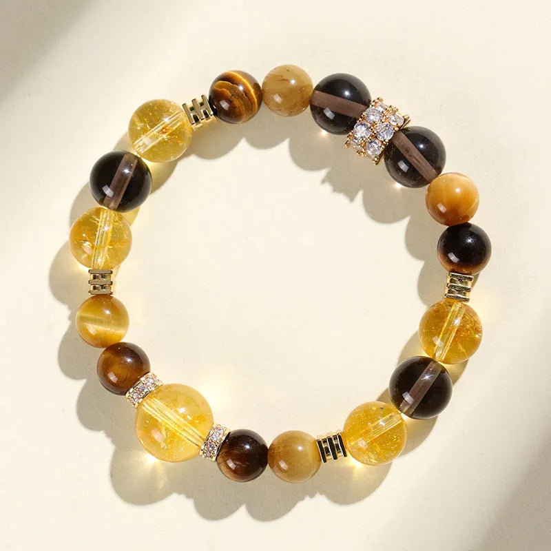 Women's natural yellow tower crystal string bead bracelet with 10mm round beads.