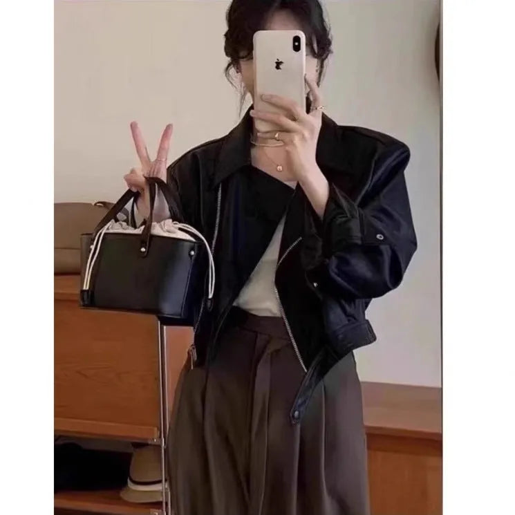 Women's brown retro leather coat jacket with slim fit, regular sleeves, and practical pockets