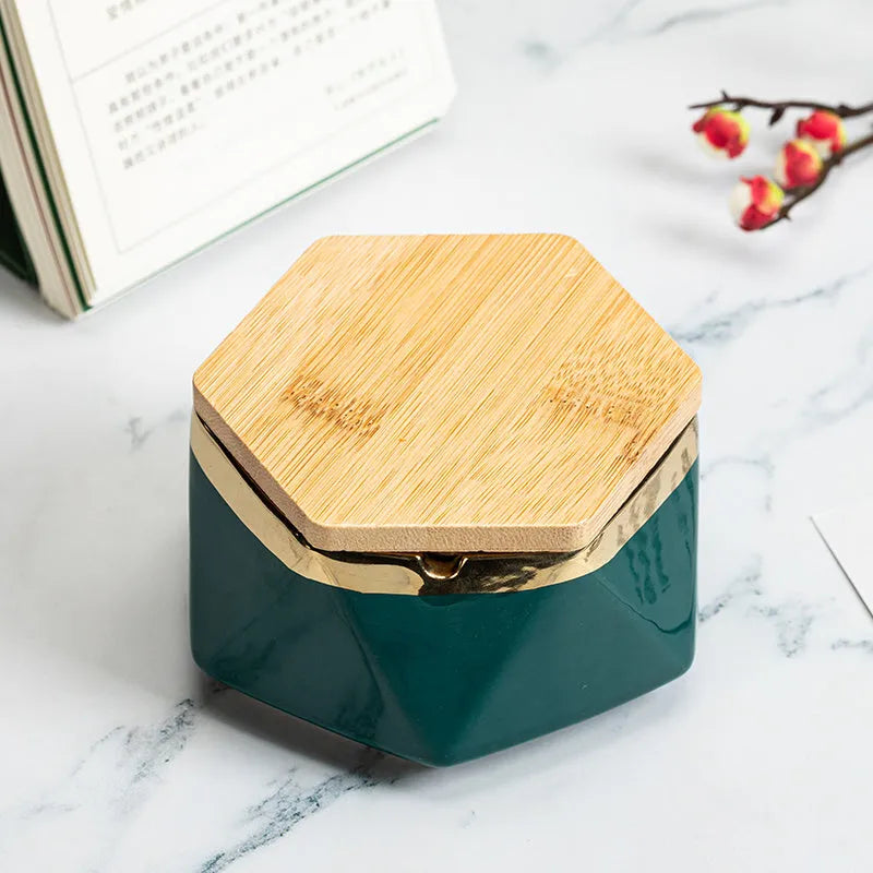 Ceramic ashtray with lid, Nordic style, available in multiple colours, on a tabletop