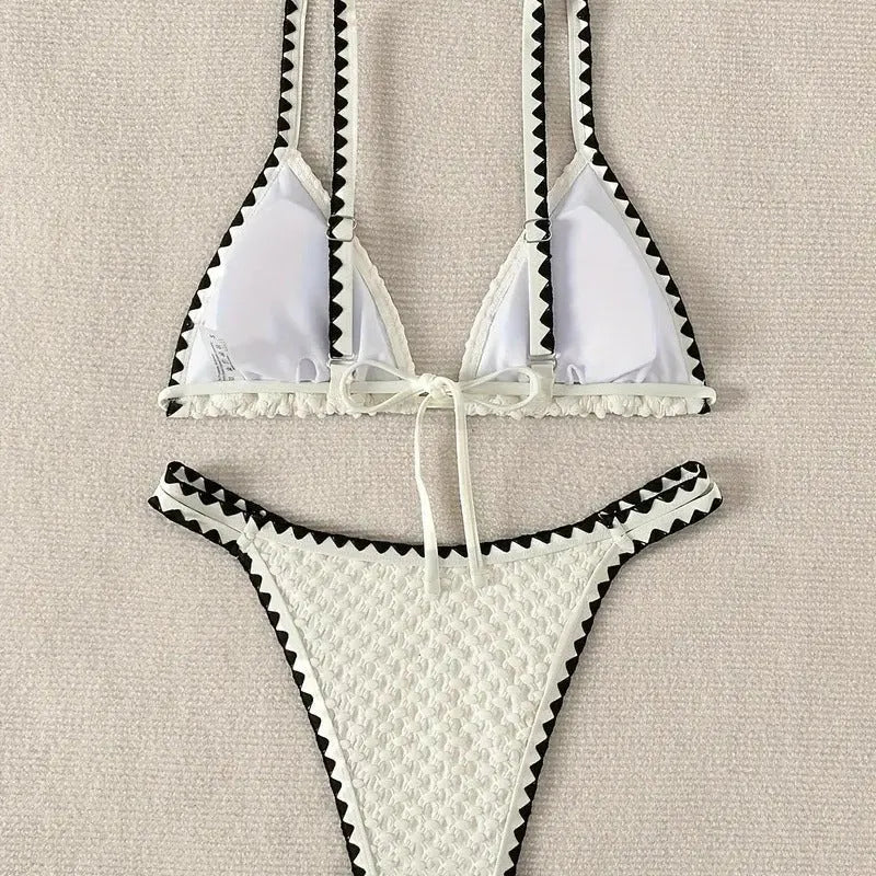 Women's white and blue split bikini swimsuit set with polyester fabric