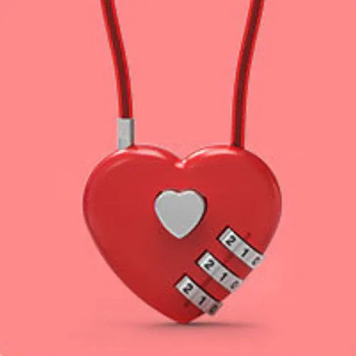 Peach heart-shaped wire rope padlock with a coiled steel cable, shown in various colours.