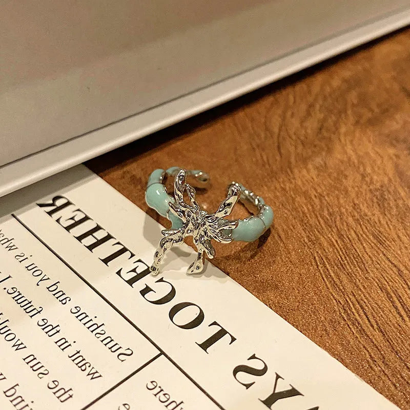 Copper women's ring with Chinese butterfly design and oil-drip finish in simple jewellery style