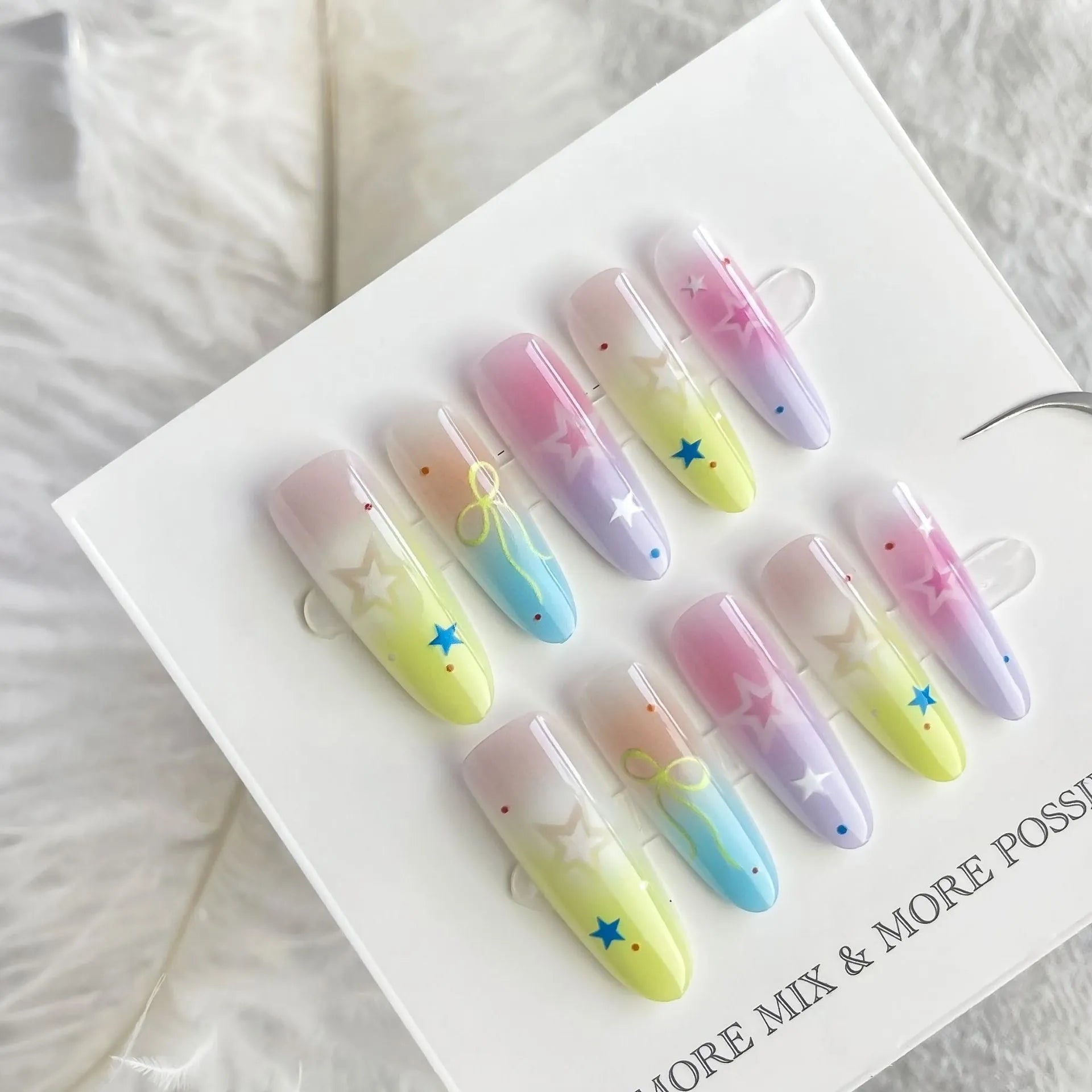 Dopamine Cartoon XINGX oval almond nail sticker set in sweet XB11-880 colour, natural frosted non-sealing layer, on a woman's nails.