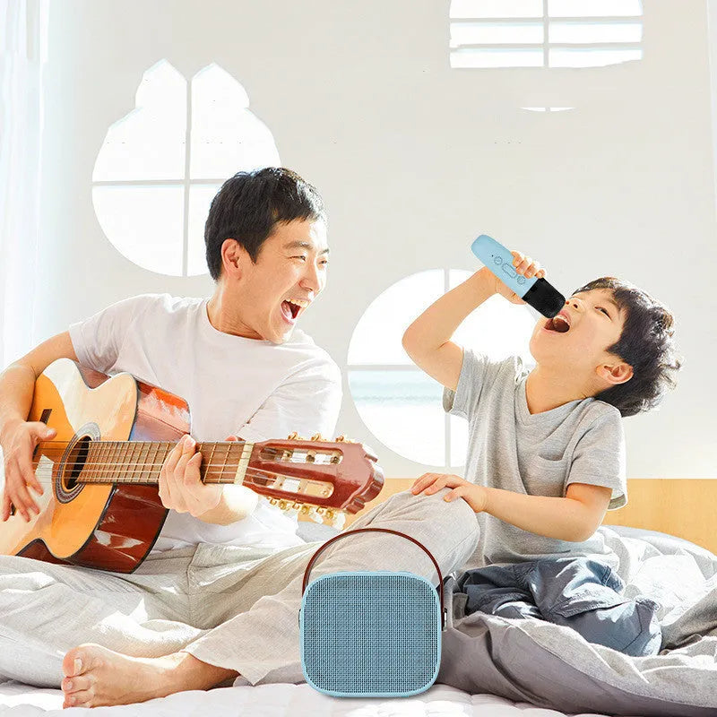 Compact white portable Bluetooth speaker with microphone for wireless audio and hands-free calling