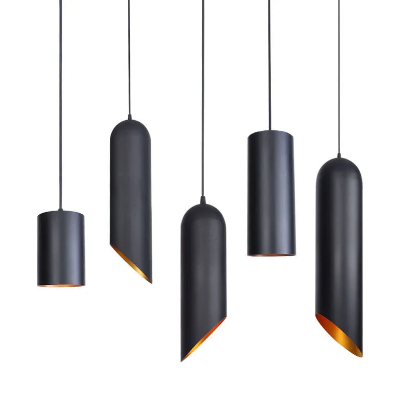 Retro geometric iron chandelier in matte black finish with multiple arms, hanging from a ceiling.