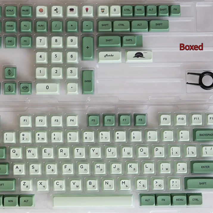124 PBT dye-sublimation keycap set in matcha green colour on a keyboard.