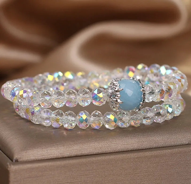 White crystal double ring bracelet for women with electroplated finish on light background