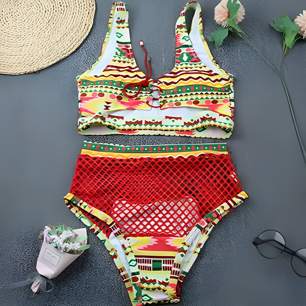 Women's checkered multicolour bikini set with cross-strap fishnet top and high-waist briefs.