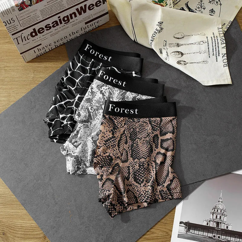Men's thin polyester boxer shorts in black colour showing mid waist design and loose fit