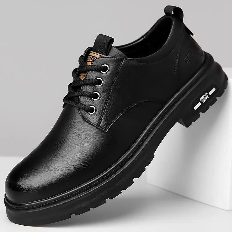Men's black retro casual leather shoes with round toe and flat square heel on a white background