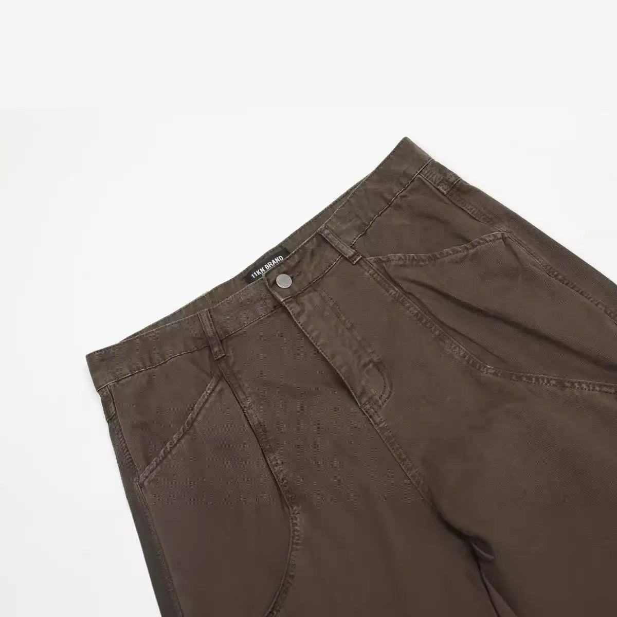 Men's loose straight-leg cotton trousers in brown colour with high waist and zip fly closure