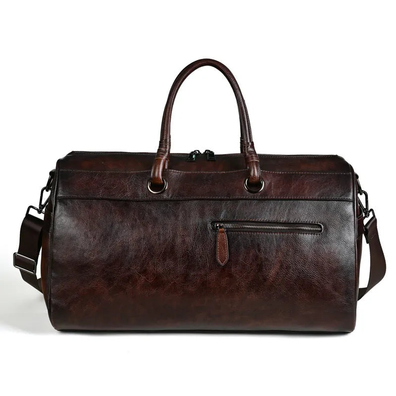 Handmade retro leather bag in vintage brown with 20L capacity and genuine leather construction